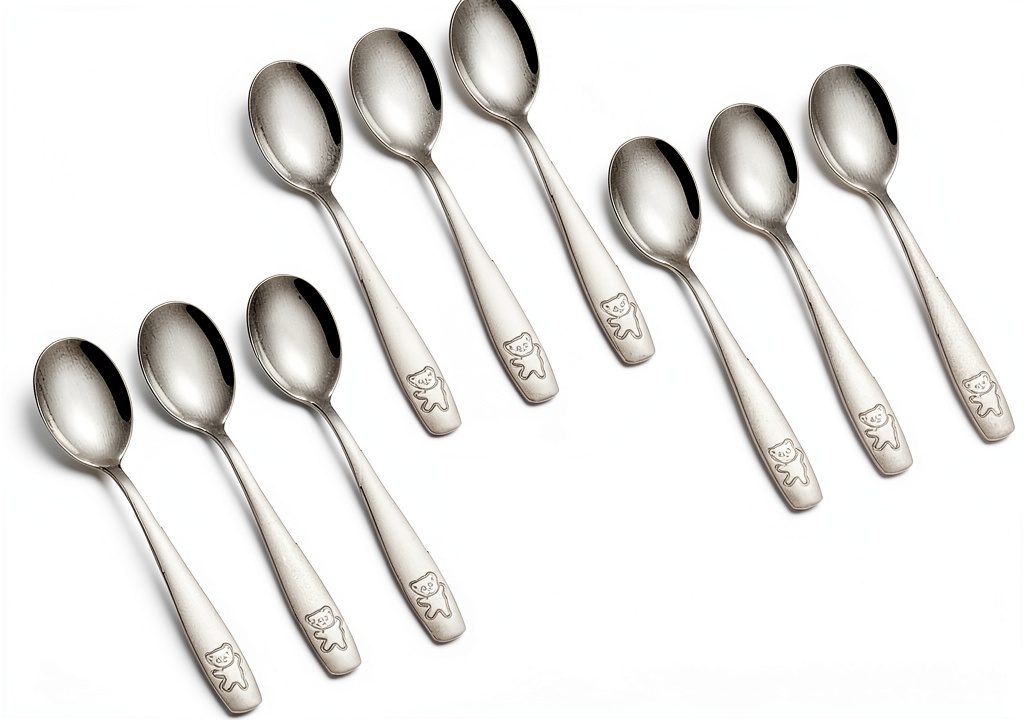Kids using Pimoys stainless steel silverware set at a colorful kitchen table
